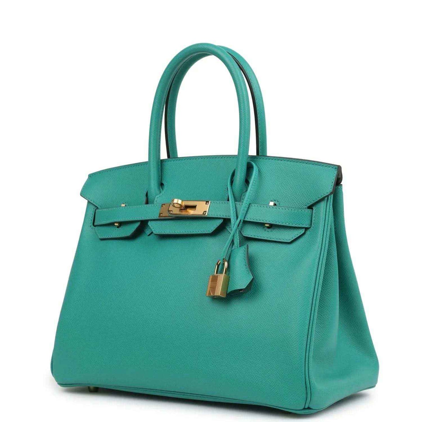 Green leather handbag with top handles, front flap and gold-tone lock hardware