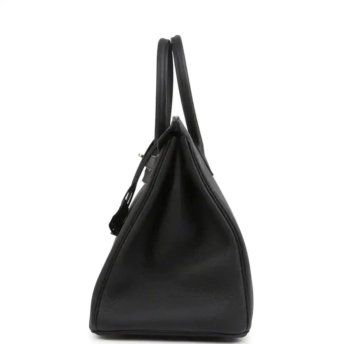 Black leather handbag with two top handles and structured side profile