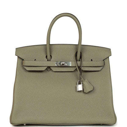 Sauge leather top-handle handbag with front flap and palladium-tone clasp