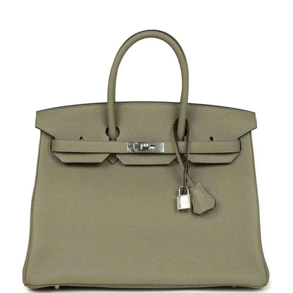 Sauge leather top-handle handbag with front flap and palladium-tone clasp