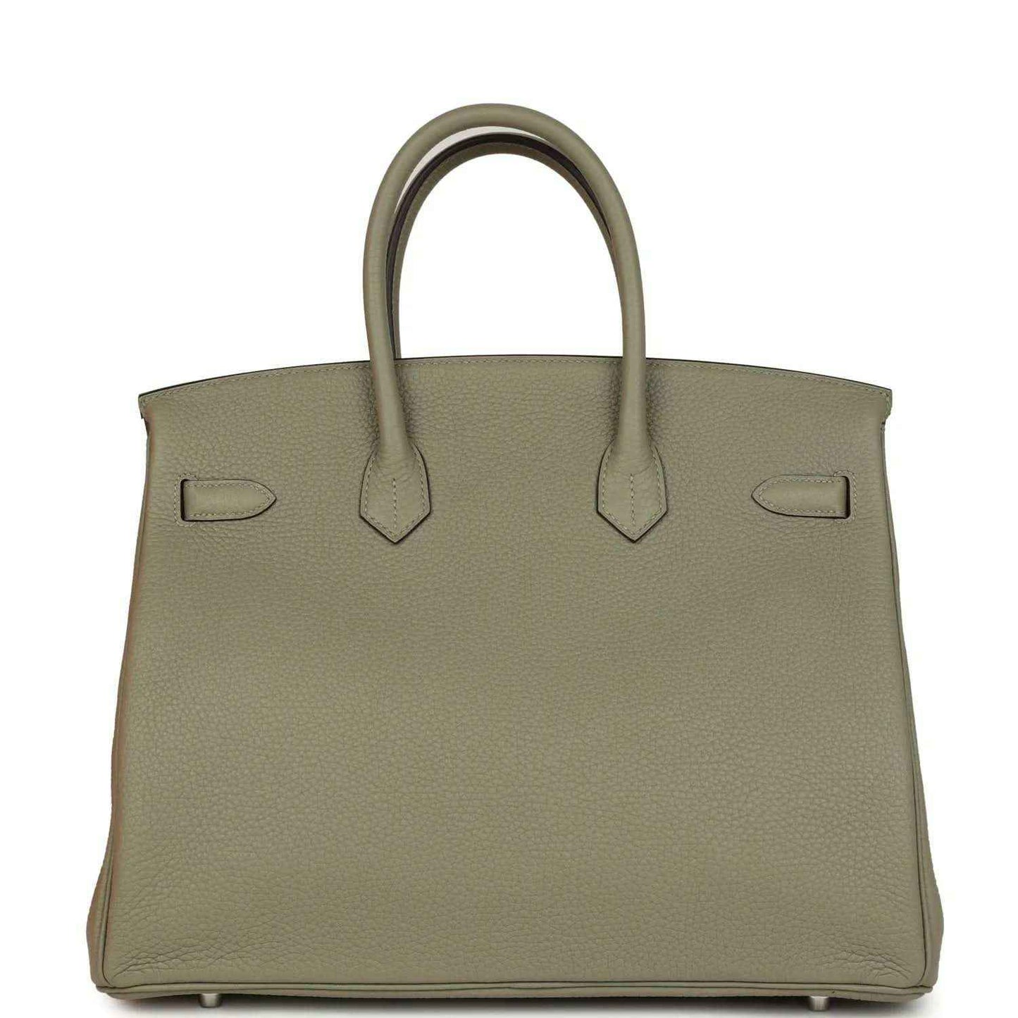 Sauge leather handbag with top handles, back straps, and protective feet