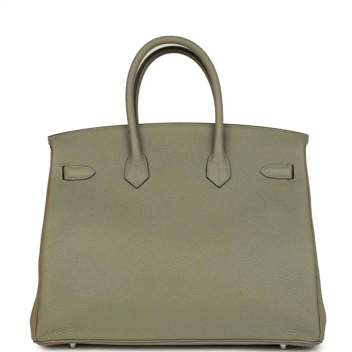 Sauge leather handbag with top handles, back straps, and protective feet