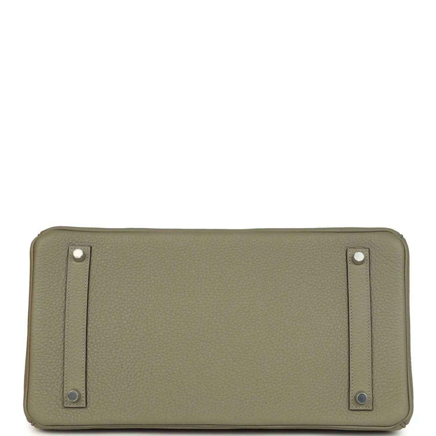 Sauge leather handbag back panel with two strap tabs and metal rivets