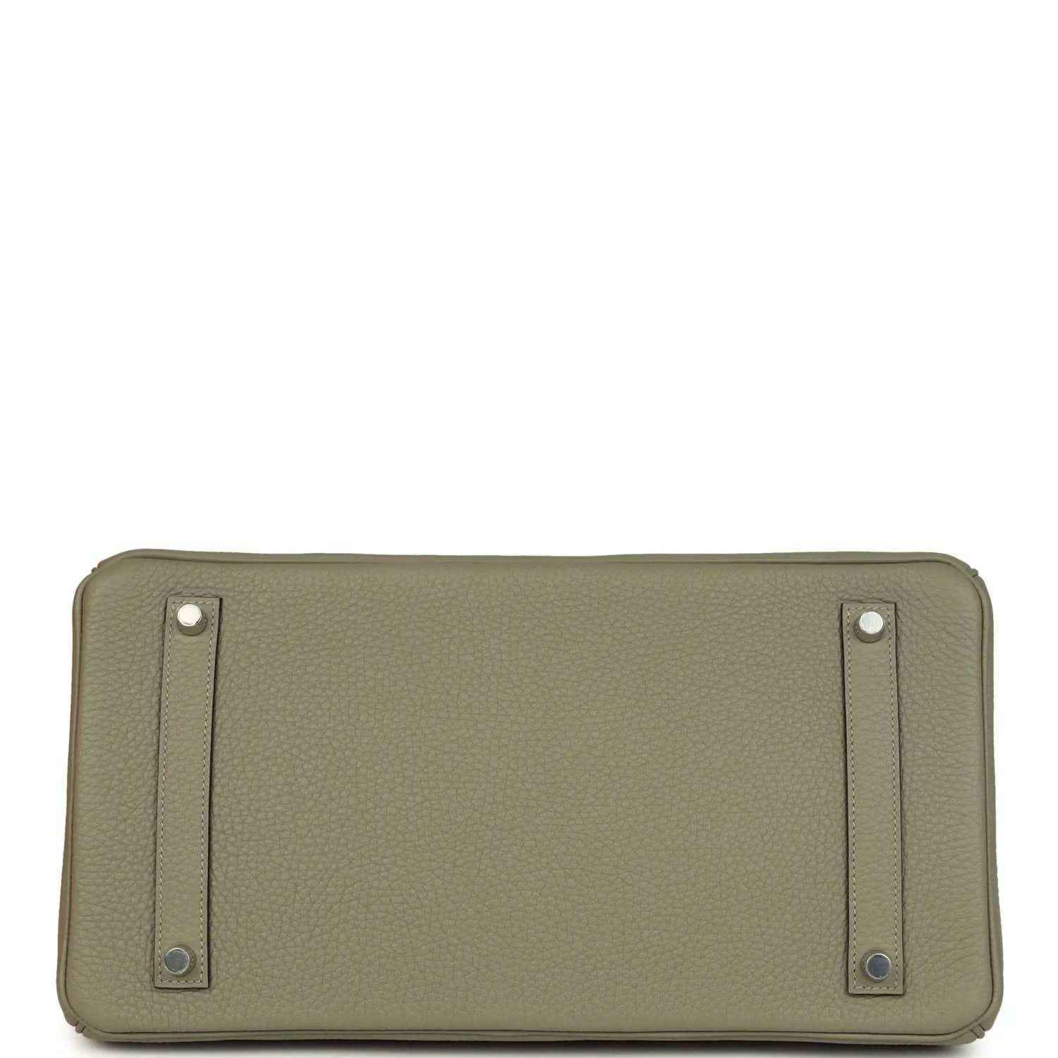 Sauge leather handbag back panel with two strap tabs and metal rivets