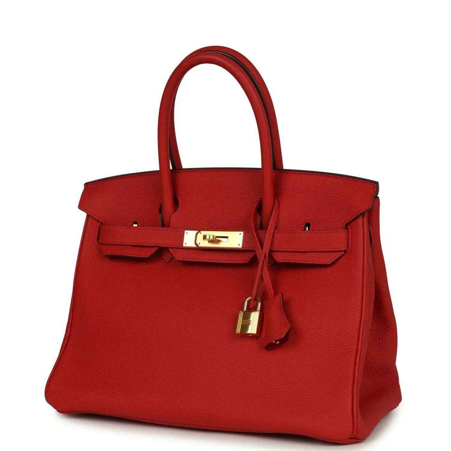 Red leather handbag front view with gold clasp and hanging lock