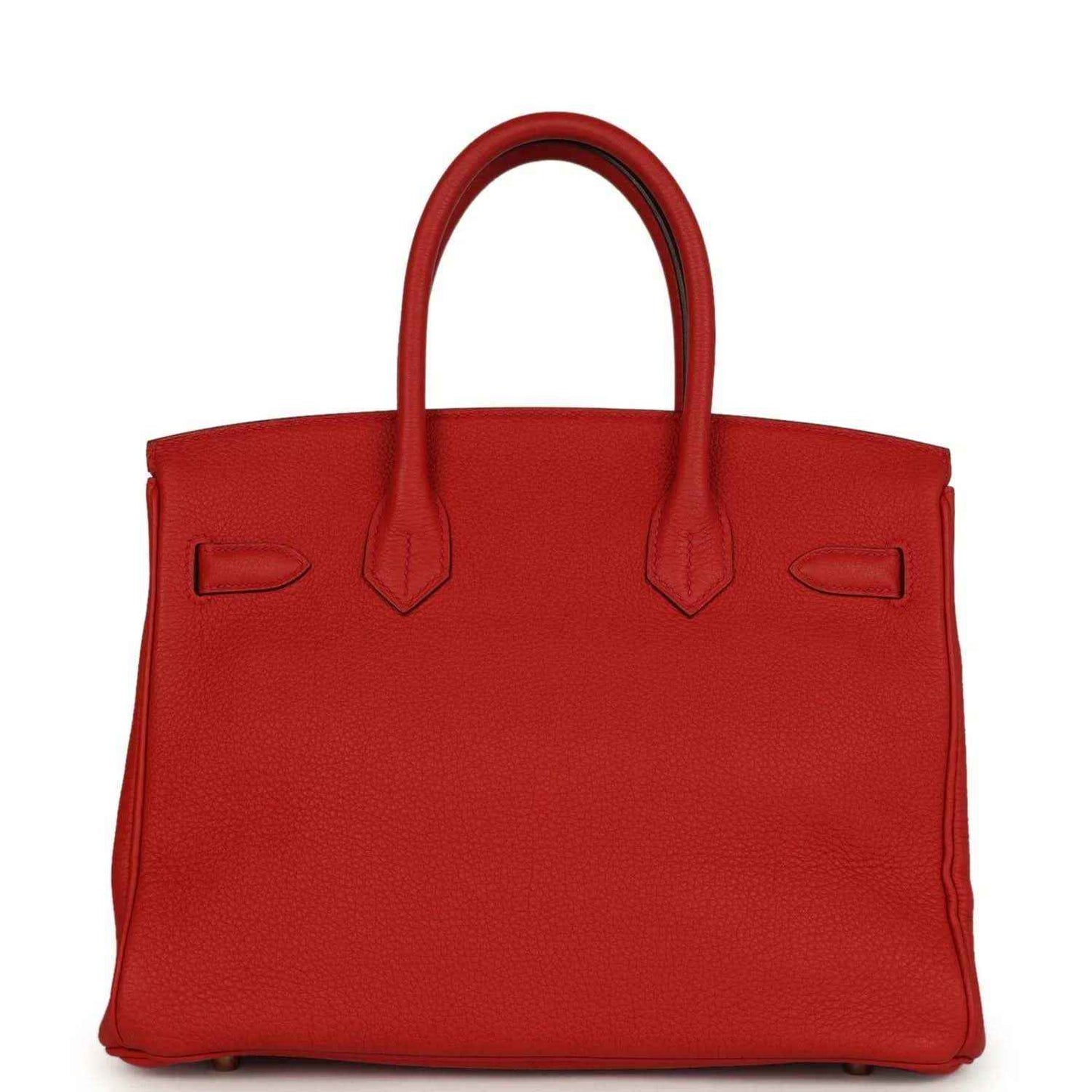 Red leather handbag back panel with molded corner details and side pockets