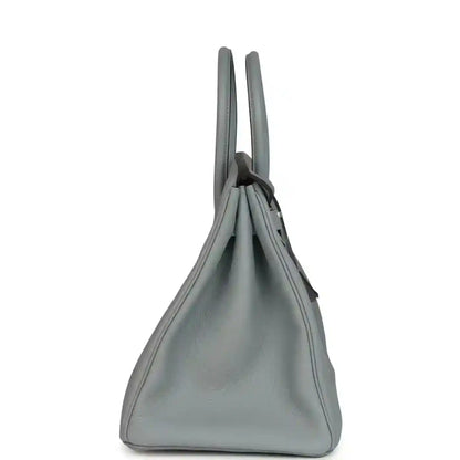 Gray Togo leather Birkin 35 handbag side view with top handles and curved silhouette