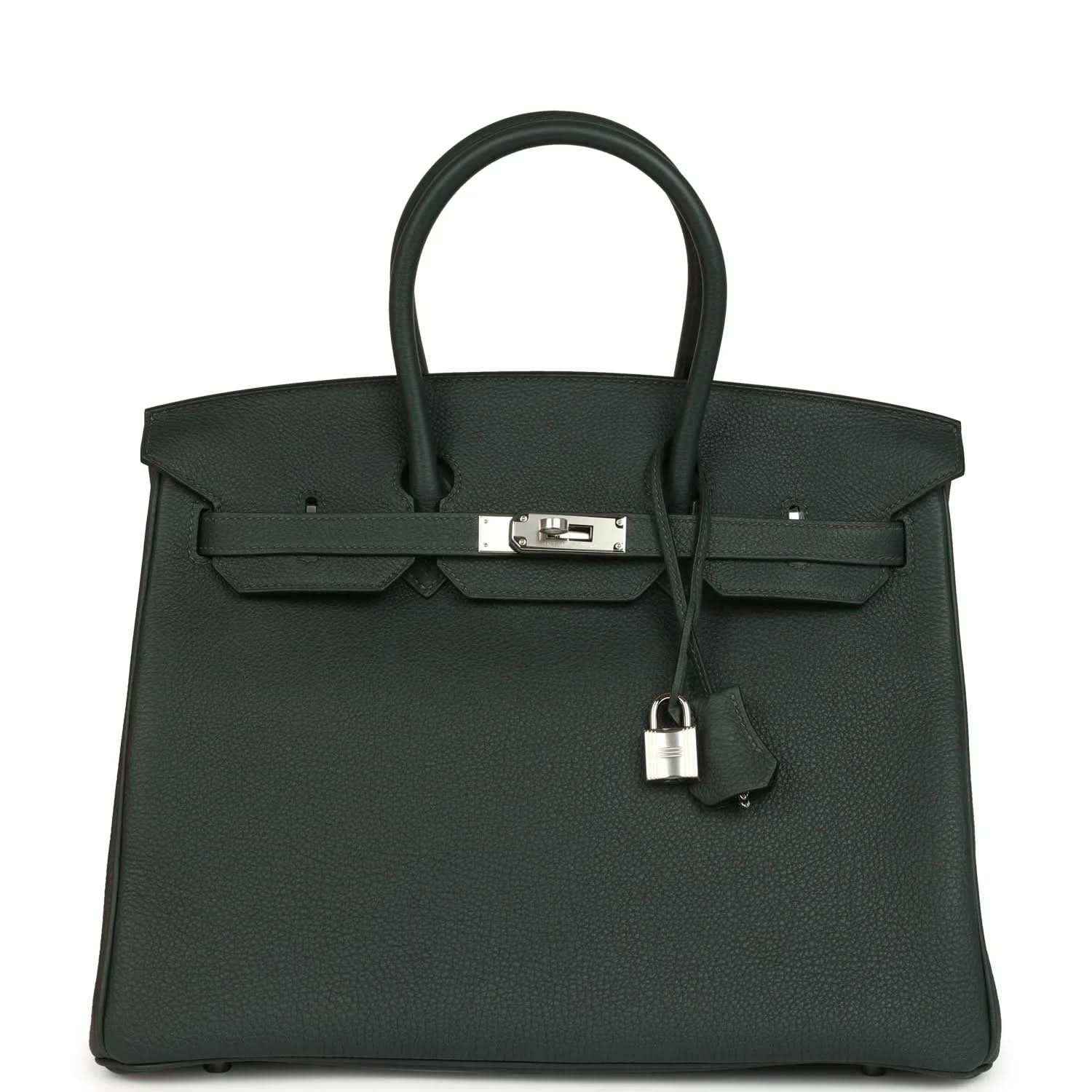 Structured handbag in dark green Togo leather with top handles and silver-tone front lock