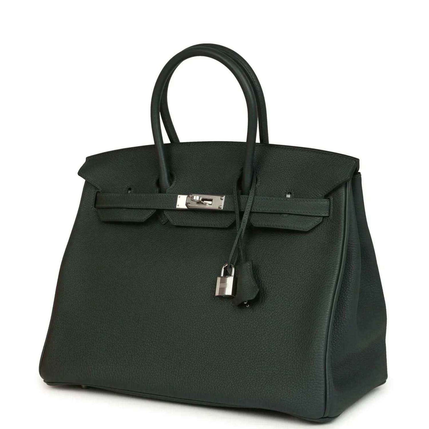 Dark green Togo leather handbag with top handles and silver-tone front lock, angled view