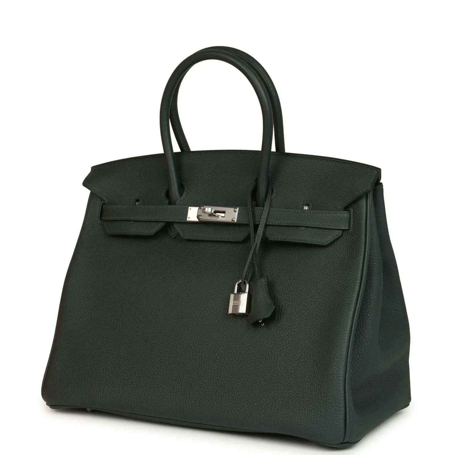Dark green Togo leather handbag with top handles and silver-tone front lock, angled view