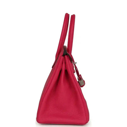 Hermes Birkin 30 leather handbag, rose pink, side view with hanging lock charm
