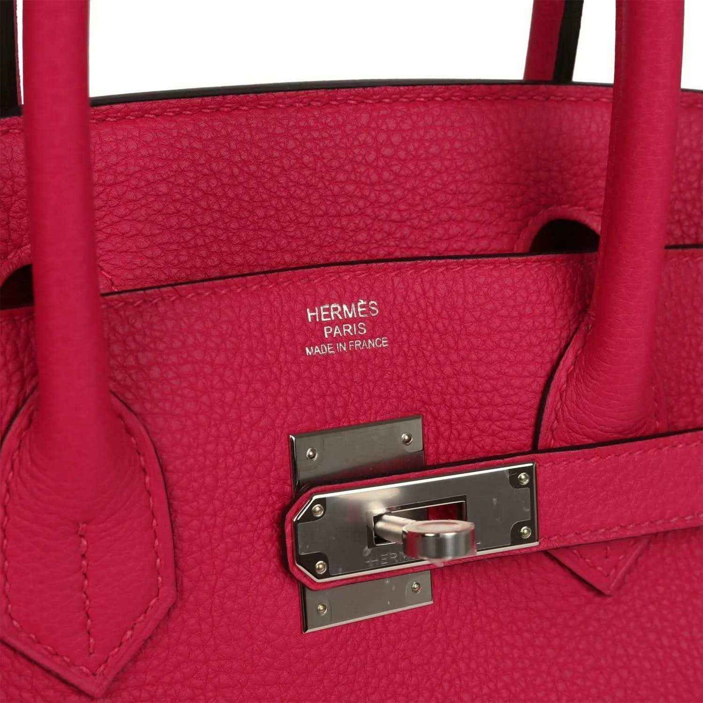 Hermes Birkin 30 leather handbag close-up: lock plate and rose pink leather stitching