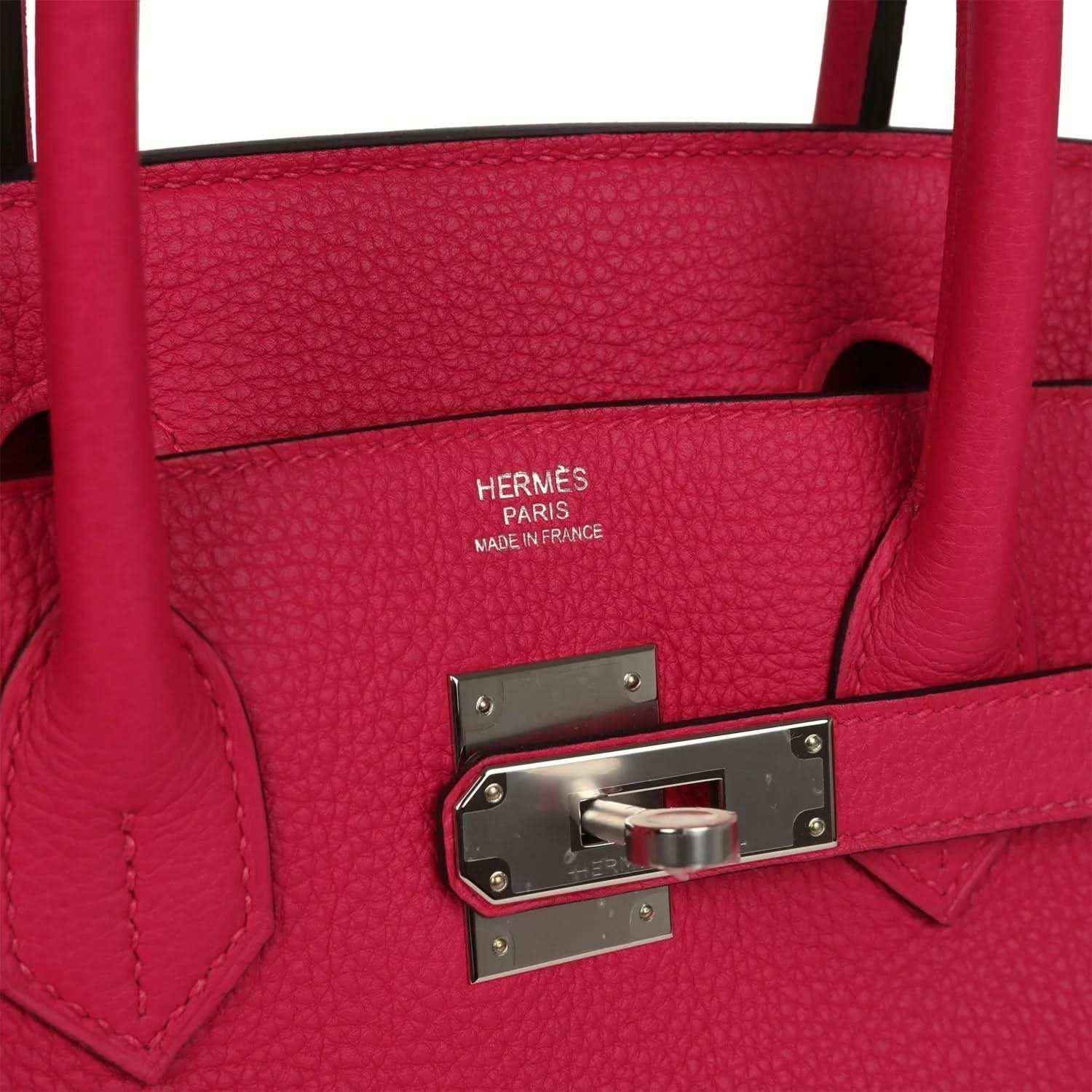 Hermes Birkin 30 leather handbag close-up: lock plate and rose pink leather stitching