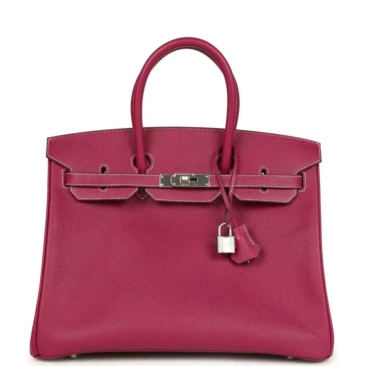Pink Epsom leather handbag with top handles, front belt clasp, and hanging padlock charm.