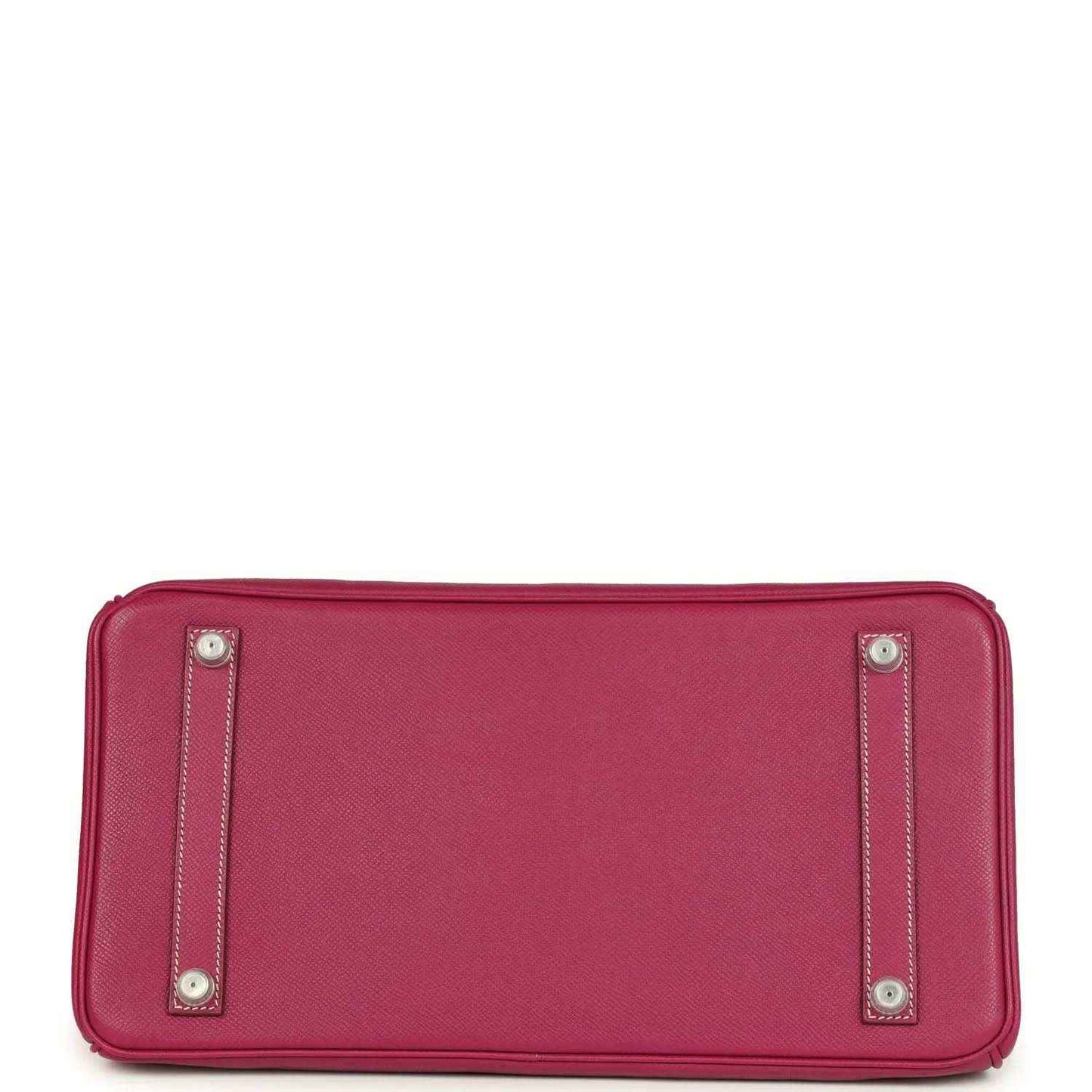 Pink Epsom leather handbag bottom with four protective studs and stitched edging.