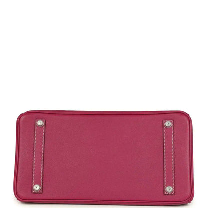 Pink Epsom leather handbag bottom with four protective studs and stitched edging.