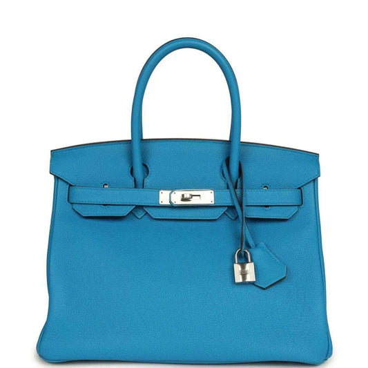 Blue leather Birkin-style handbag with top handles, front flap and lock clasp
