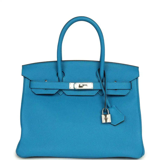 Blue leather Birkin-style handbag with top handles, front flap and lock clasp