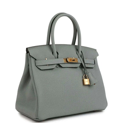 Light blue Togo leather Birkin 30 top-handle bag, gold turn-lock and lock charm
