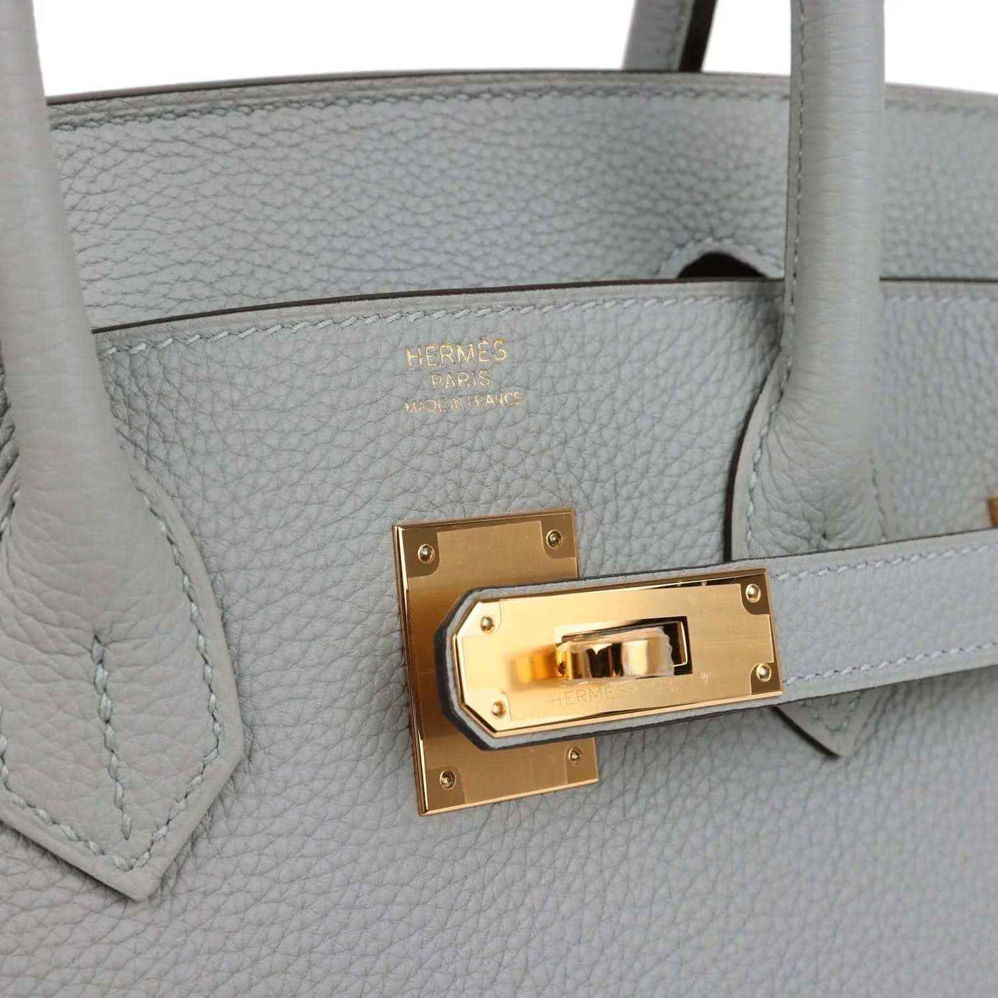 Light blue Togo leather Birkin 30 close-up: gold front turn-lock and stamp