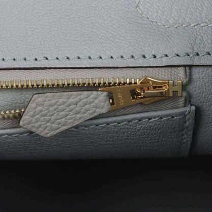 Light blue Togo leather Birkin 30 close-up: gold zipper track and zipper pull