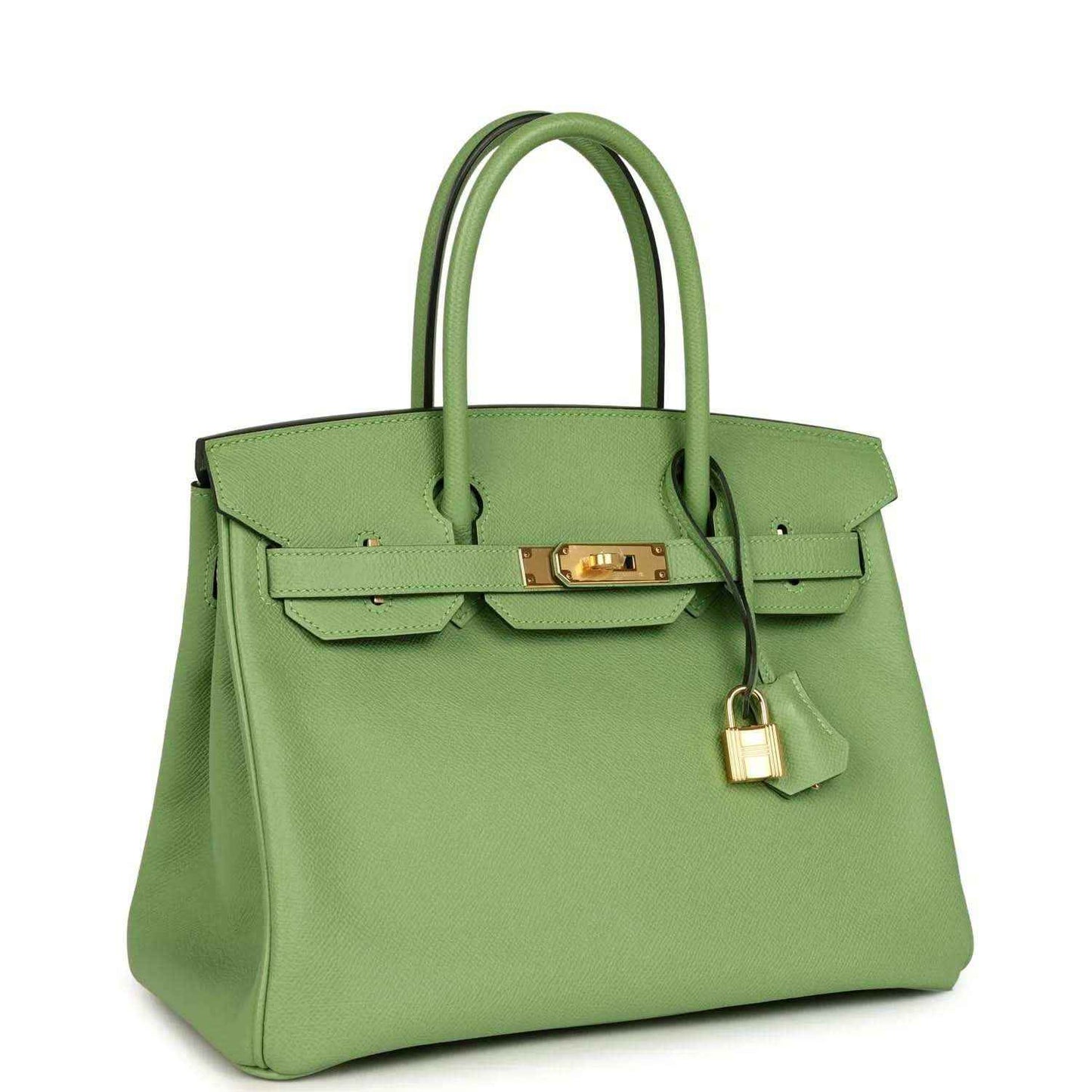 Green leather handbag with top handles, front flap, and gold-tone padlock charm
