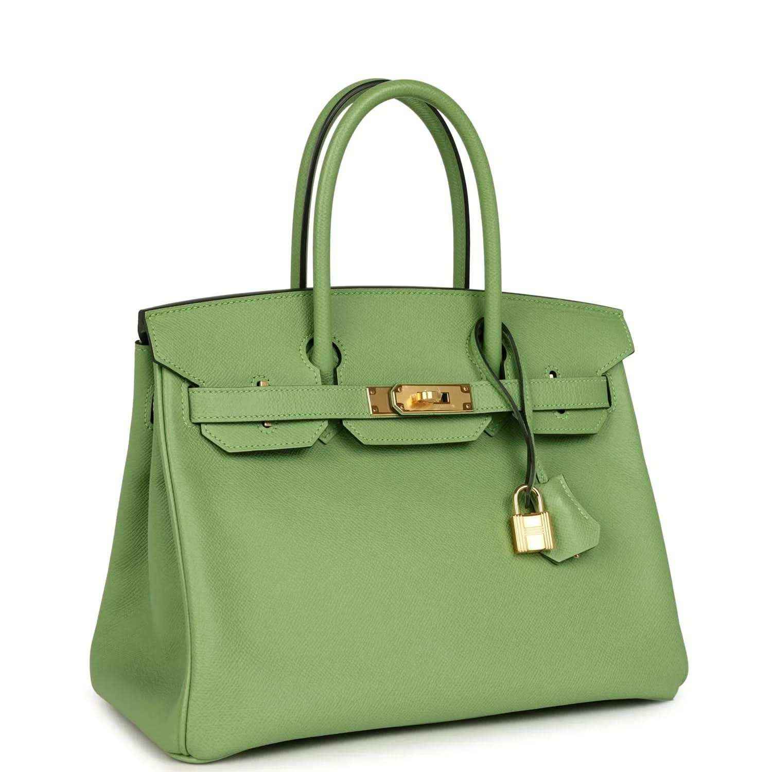 Green leather handbag with top handles, front flap, and gold-tone padlock charm
