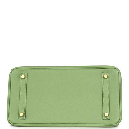 Green leather handbag base with corner stud feet and top handle attachment straps