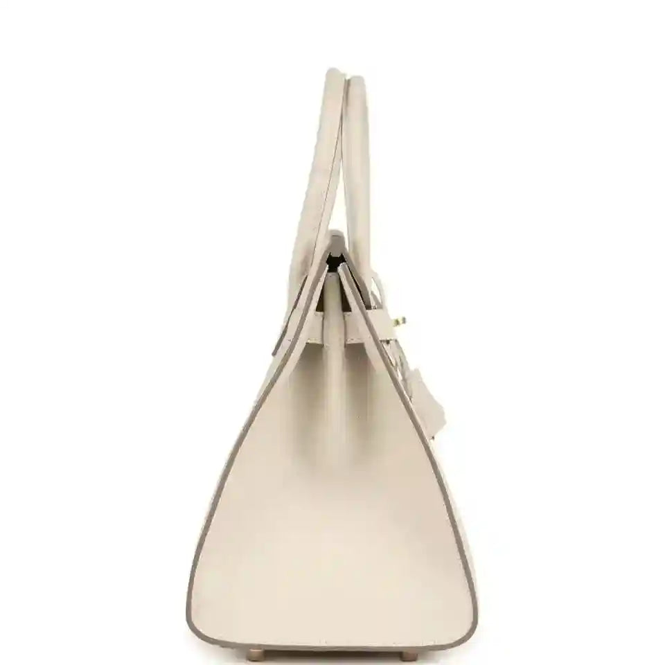 Light cream leather handbag with top handles and structured sides
