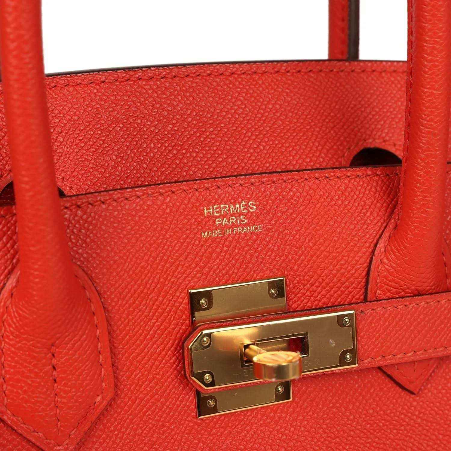 Hermes Birkin 30 interior view with red leather lining, stamp and gold lock plate