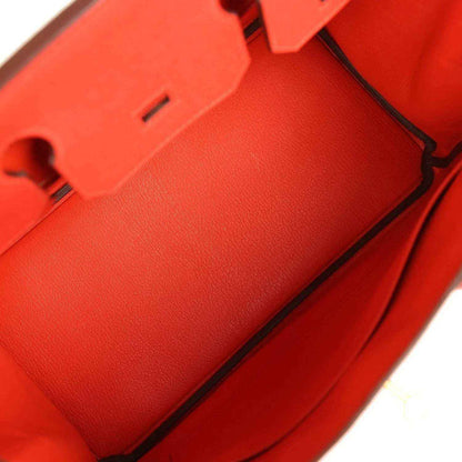 Hermes Birkin 30 red leather interior panel with black trim and inner compartments