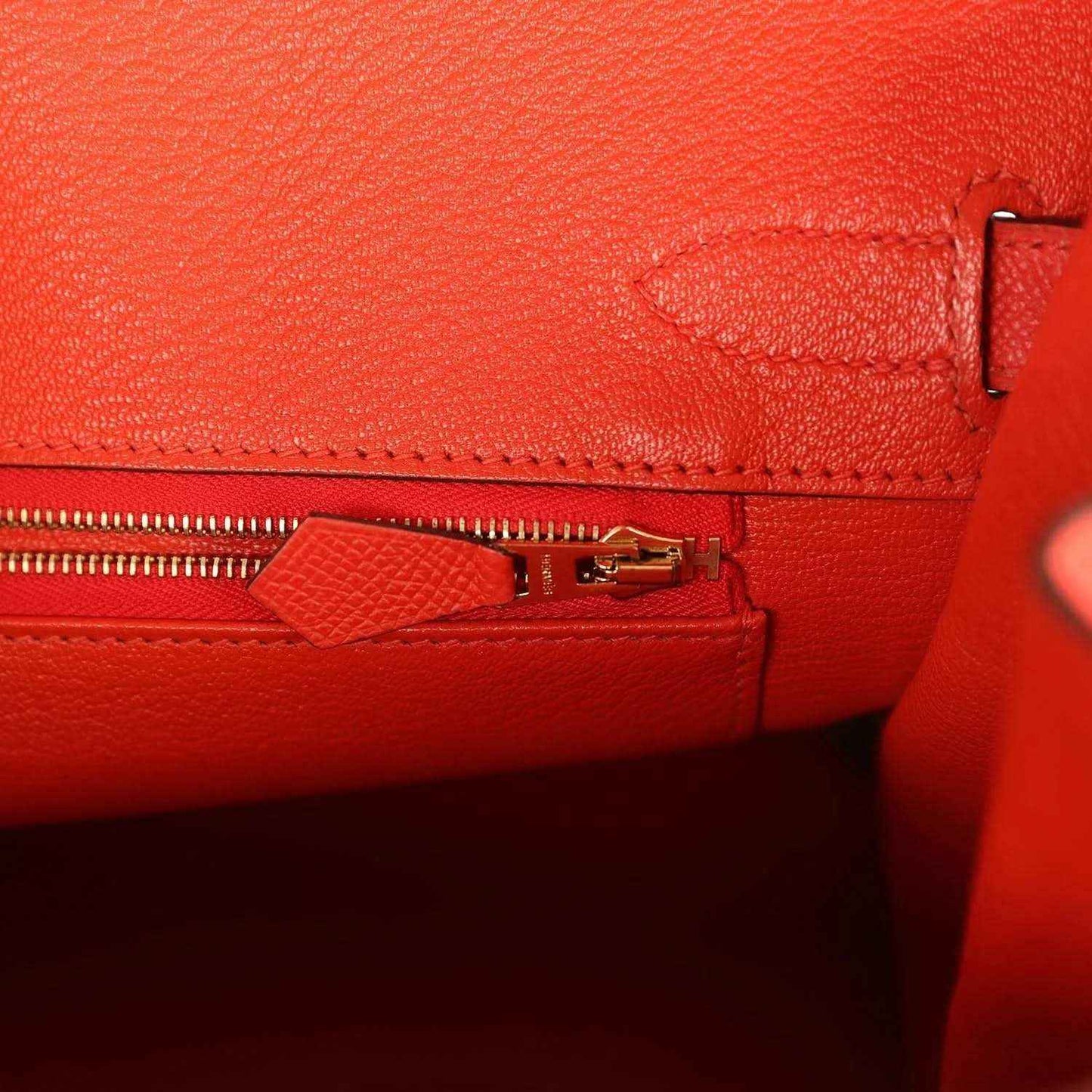 Hermes Birkin 30 interior zipper pocket with red leather tab and gold hardware