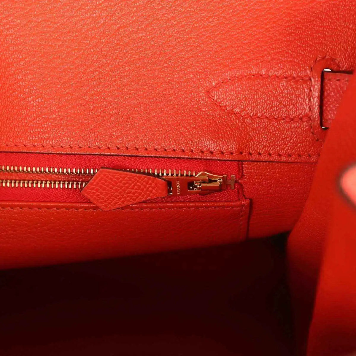 Hermes Birkin 30 interior zipper pocket with red leather tab and gold hardware