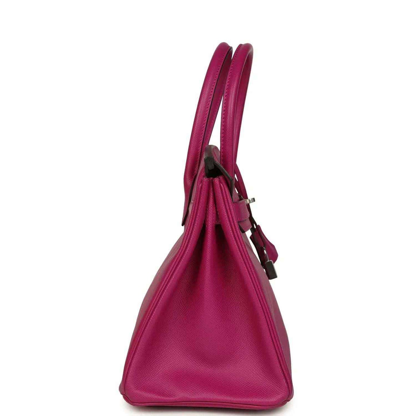 Rose-purple pebbled leather handbag side view with top handles and slim strap loop