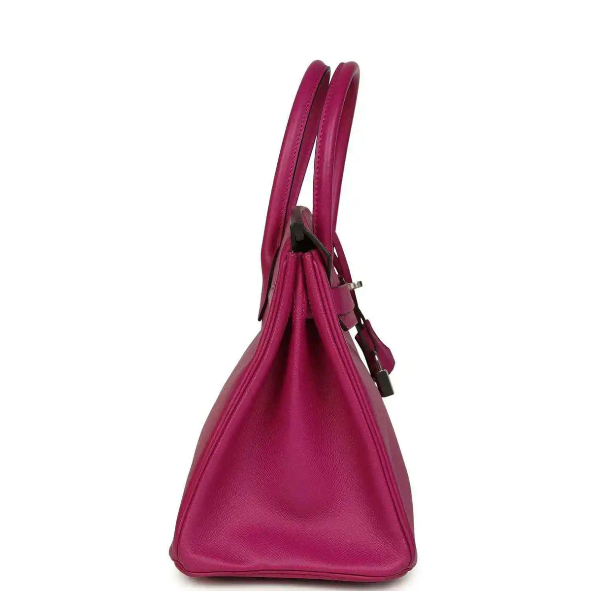 Rose-purple pebbled leather handbag side view with top handles and slim strap loop
