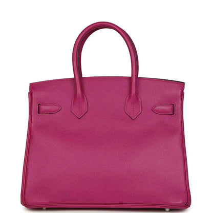 Rose-purple pebbled leather handbag front view with top handles and stitched flap details