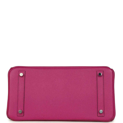 Rose-purple pebbled leather handbag base with corner feet and side strap accents