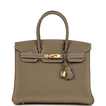 Taupe Togo leather Birkin 30 handbag with gold-tone hardware and top handles.