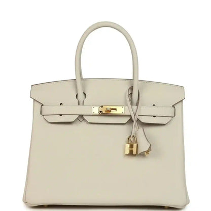 Hermes Birkin 30 handbag in light cream leather with gold lock and front flap