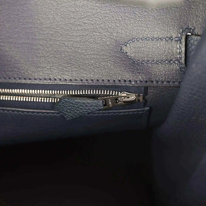 Blue leather Birkin 30 handbag interior pocket with zip pull and stitching
