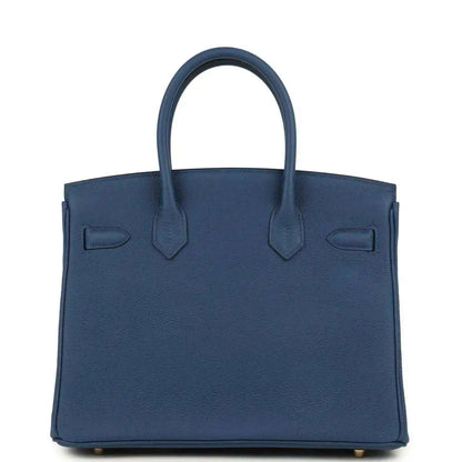 Blue Birkin 30 handbag front view with top handles and flap detailing