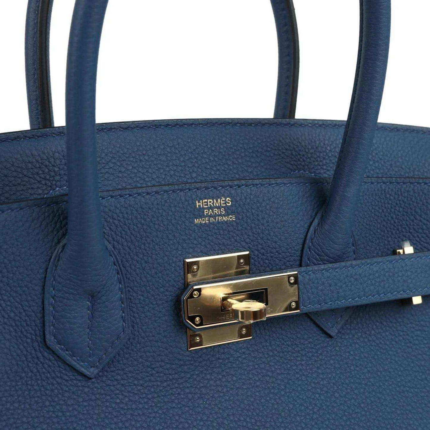 Hermes Birkin 30 handbag top clasp with engraved plate and gold-tone lock on strap