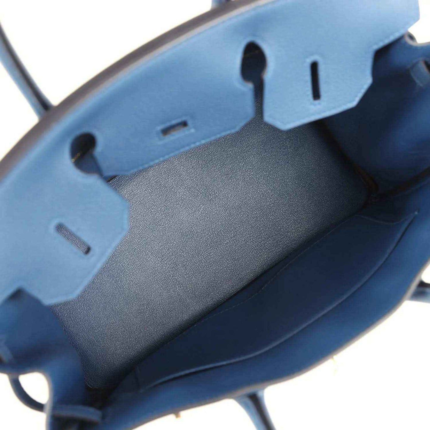Blue Birkin 30 handbag interior with partition pockets and visible lining
