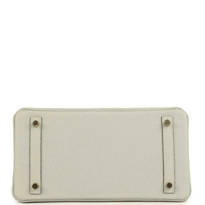 Light gray leather handbag base with four metal feet and reinforced corner tabs