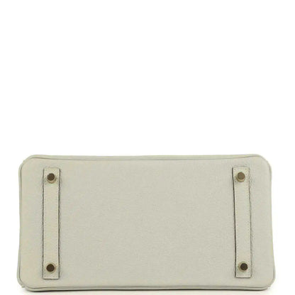 Light gray leather handbag base with four metal feet and reinforced corner tabs
