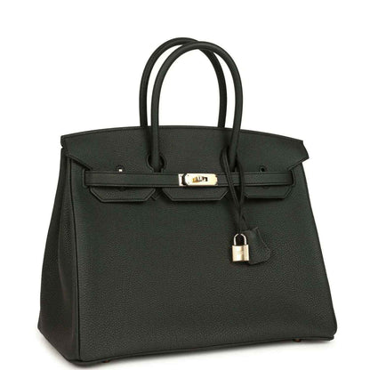 Birkin 35 dark green leather handbag with top handles and front lock, angled view