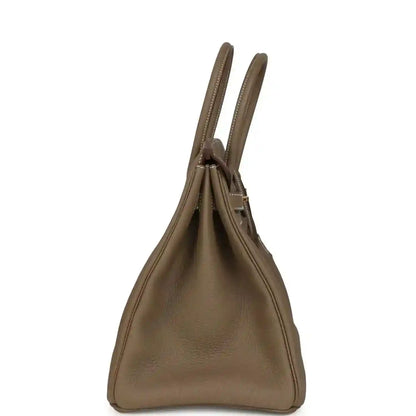 Taupe Birkin 35 handbag side view with two handles and pebbled leather body