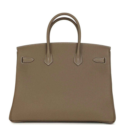 Taupe Birkin 35 handbag top view with front flap pockets and contrast white stitching