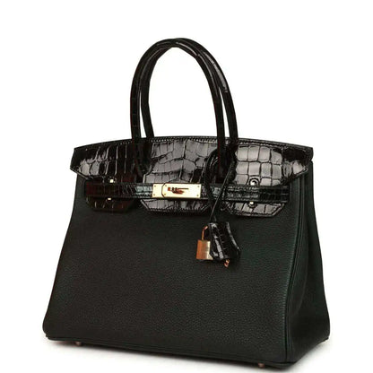 Dark green leather handbag with glossy crocodile-effect top flap and gold-tone clasp