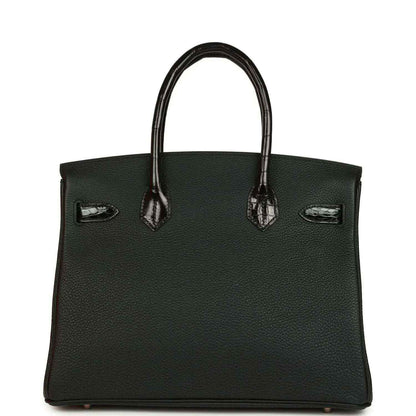 Dark green leather handbag with crocodile-effect trim and front lock hardware